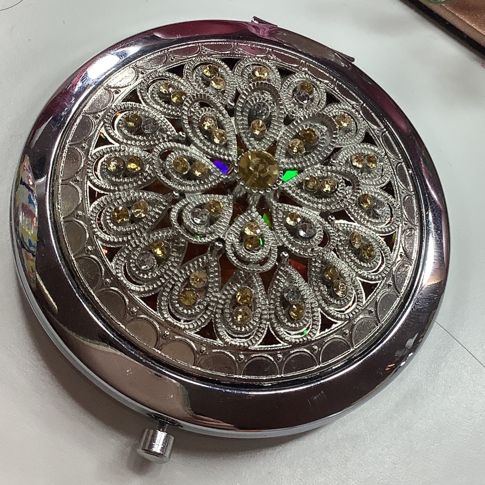 Reflective travel mirror